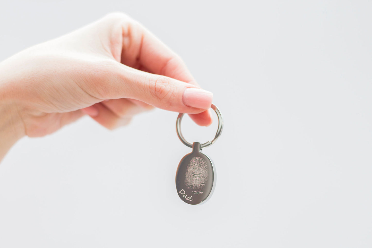 Oval engraved fingerprint keyring