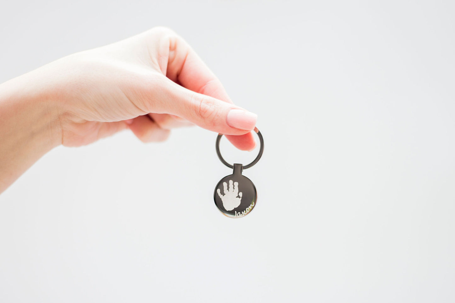 Circle engraved hand/foot print keyring