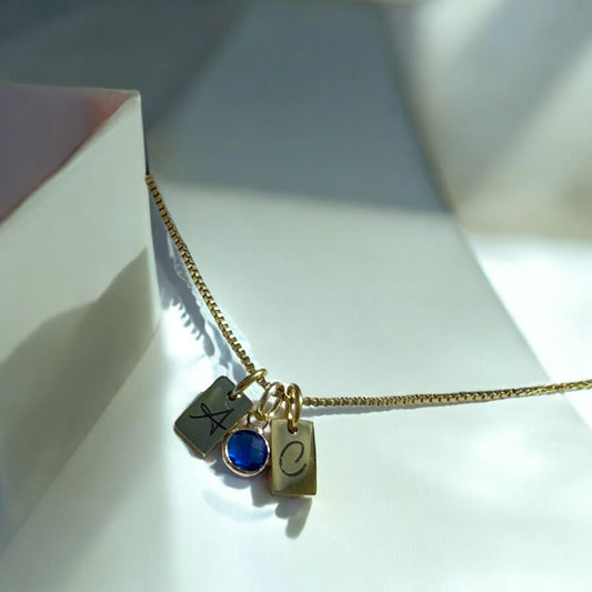 Gold initial gemstone necklaces