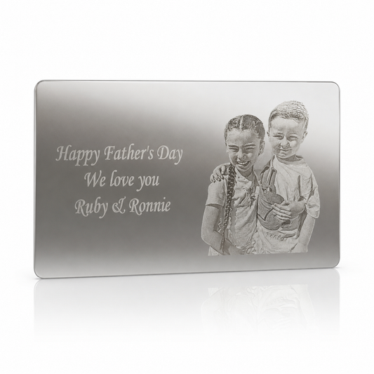 Metal plaque with engraved photo of two children and 'Happy Father's Day' message on a white background