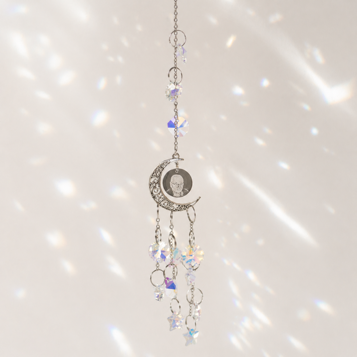 Decorative personalised hanging chain with crystal elements on a sparkling background