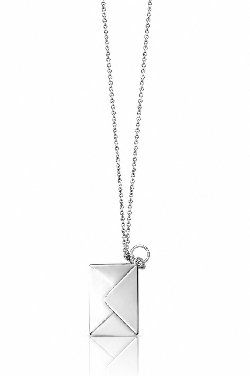 Silver envelope necklace with a geometric pendant on a white background