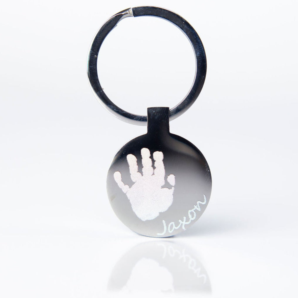 Circle engraved hand/foot print keyring