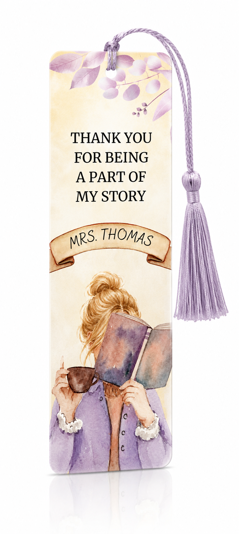 A personalized paper bookmark with a lavender tassel, featuring the printed message 'THANK YOU FOR BEING A PART OF MY STORY' and 'MRS. THOMAS' on a cream background with watercolor illustrations of a woman reading and purple leaves at the top.